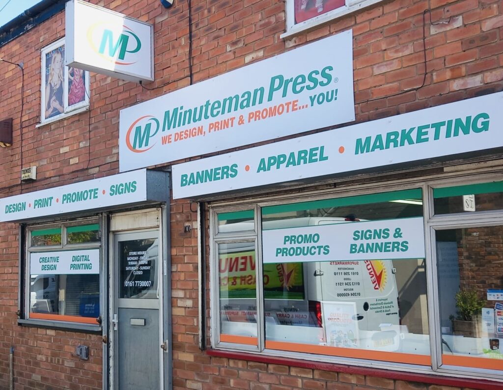 Retail shop-front and signage for Minuteman Press in Greater Manchester client of Peter James White Electrical Ltd's commercial electrical services